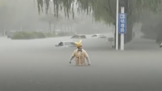 Torrential rain batters central Chinas Zhengzhou City [upl. by Puett]