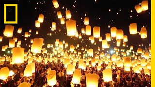 Watch as Lanterns Fill the Sky in Thailand  National Geographic [upl. by Willet723]